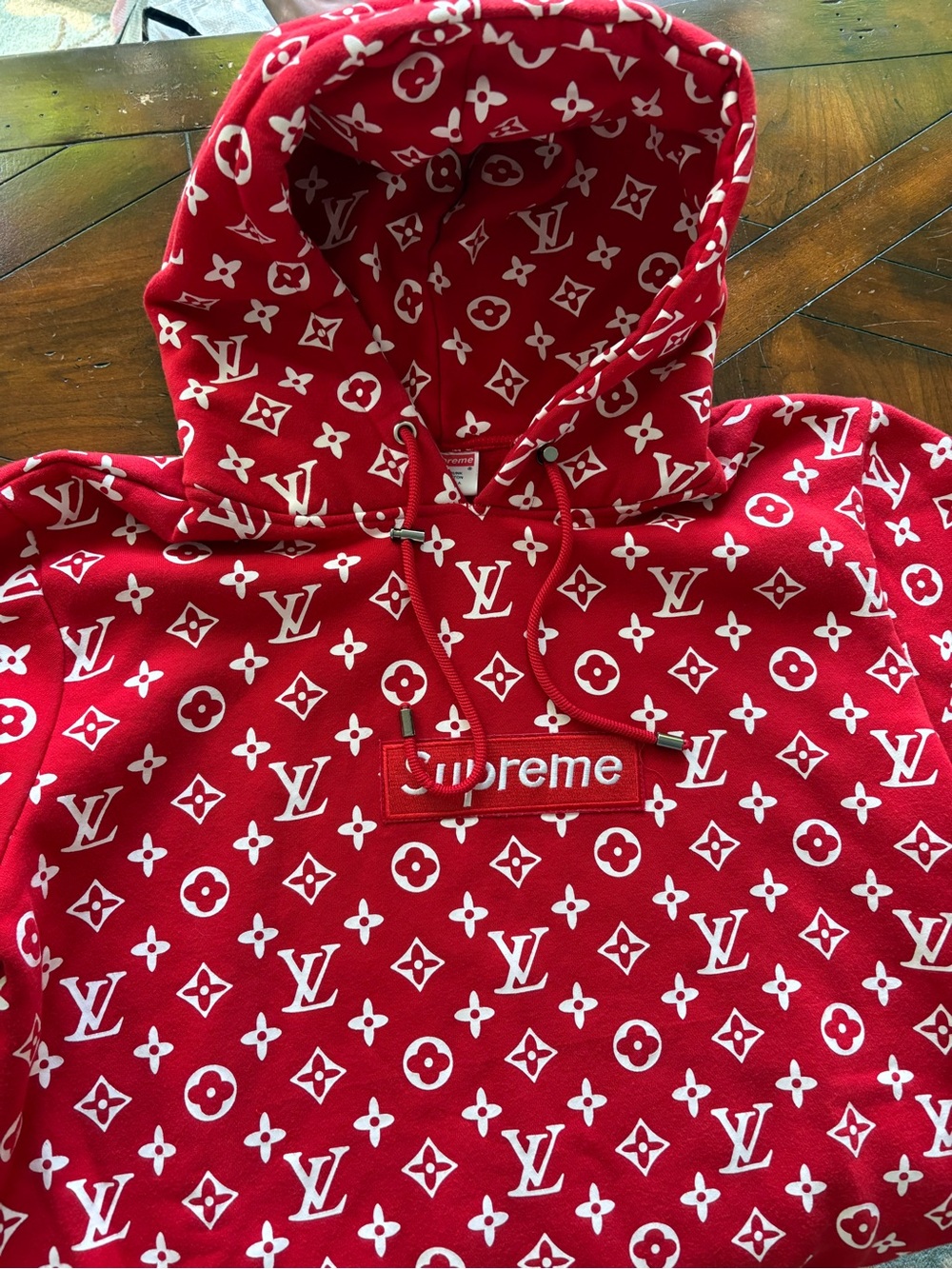 Supreme Red Hoodie with White Monogram Print